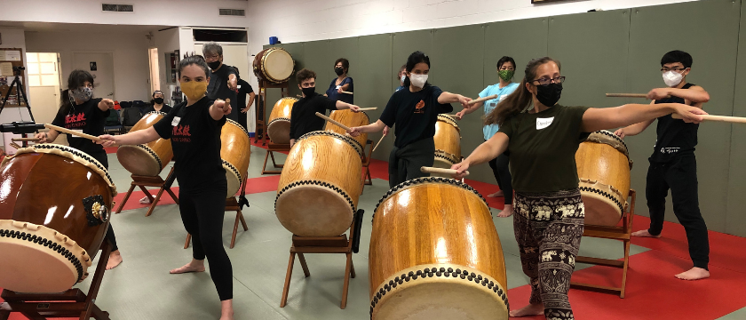 Participants learn lines from the piece "Matsuri"