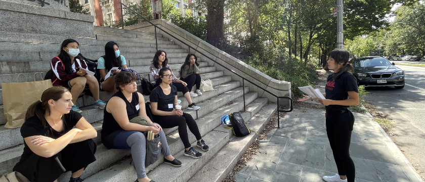 Workshop participants learn about the history of taiko.