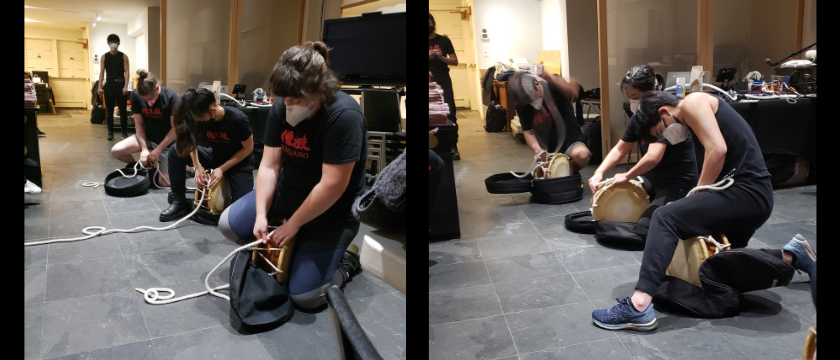 Trainees tying shime-daiko drums as part of their review