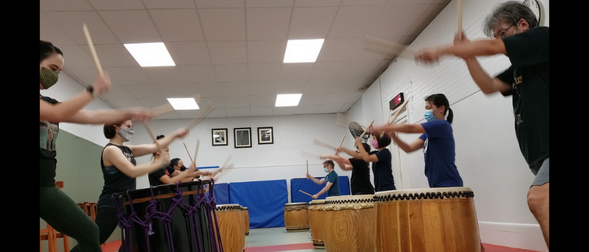 Trainees practicing with Soh Daiko members in down-stand style