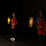 Soh Daiko probationary members holding lanterns for Miyake Daiko.