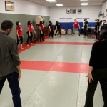 Group stretches before drumming!