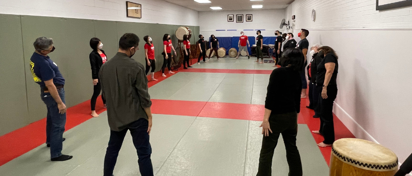 Group stretches before drumming!